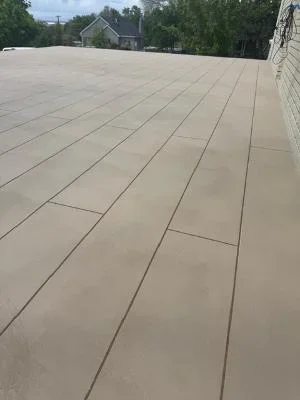 Large deck with linear board pattern and protective coating application
