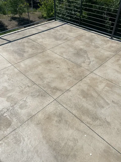 Large concrete paver deck with protective coating and clean grout lines